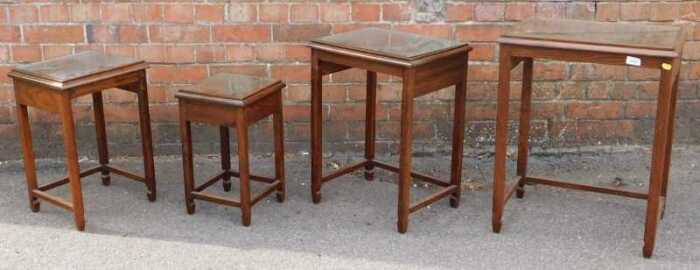 A nest of four tables.