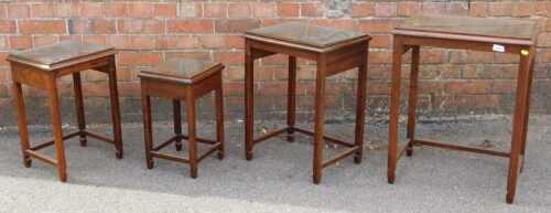 A nest of four tables.