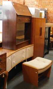 Furniture, comprising a fall front bureau, pigeon holes to interior over drawer, above two glass...