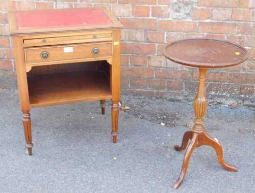 A wine table, circular topped, raised on tripod base, a small oak cabinet with tooled leather...