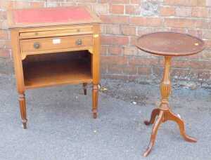 A wine table, circular topped, raised on tripod base, a small oak cabinet with tooled leather...