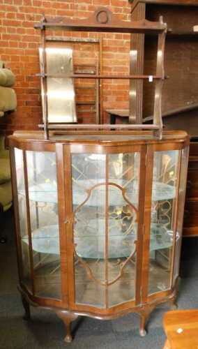 Furniture, comprising a walnut veneered display cabinet, with single glazed door, glazed panels,...