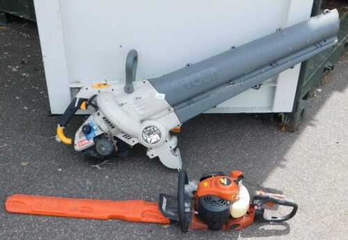 A Ryobi petrol leaf blower, RBL30MVA, together with an Echo petrol hedge trimmer, HCR-161ES. (2)