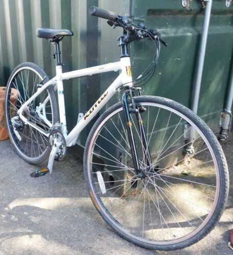 A Kona Dew aluminium framed bicycle, in white trim.