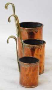 A set of three Victorian graduated copper and brass cream ladles, two pint, one pint, and half... - 3