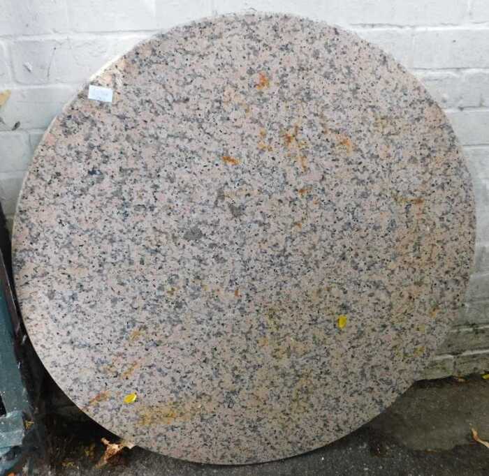 A marble table top, 90cm diameter.