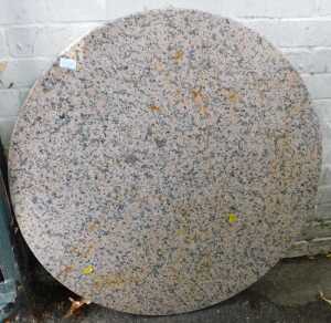 A marble table top, 90cm diameter.