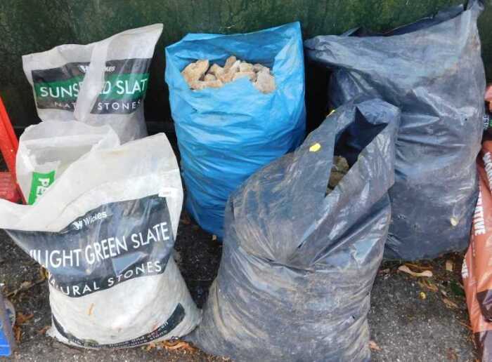 Three bags of Cotswold rockery stones, together with green slate chips, etc. (6 bags)