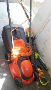 A Flymo electric lawn mower, together with Ryobi electric garden power tools, comprising two...