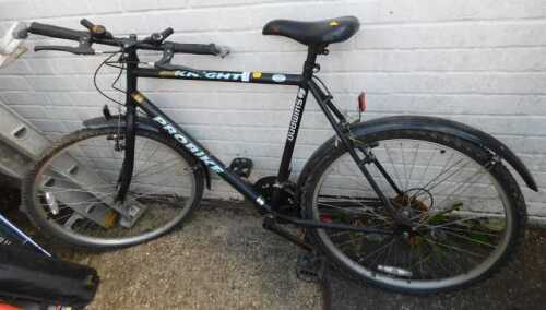 A Shimano Pro Bike Black Knight bicycle, in black trim.