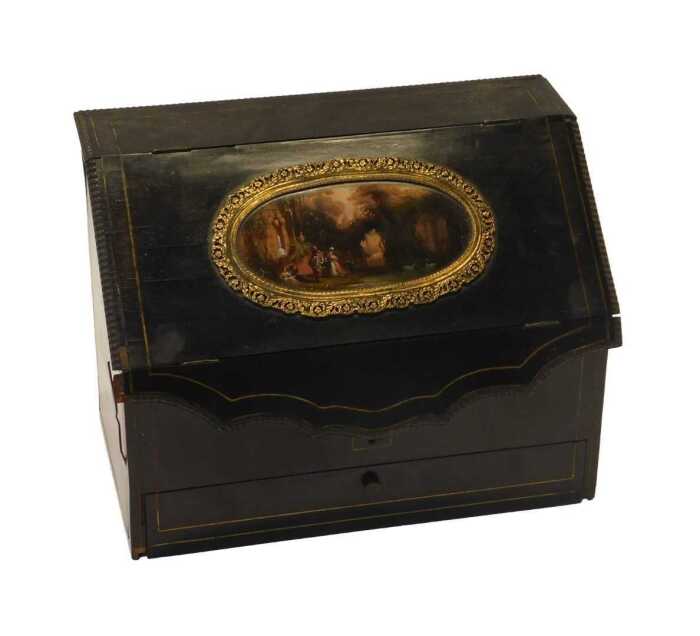 A Victorian coromandel veneered stationery box, the bureau shaped case set to the "fall" with a...