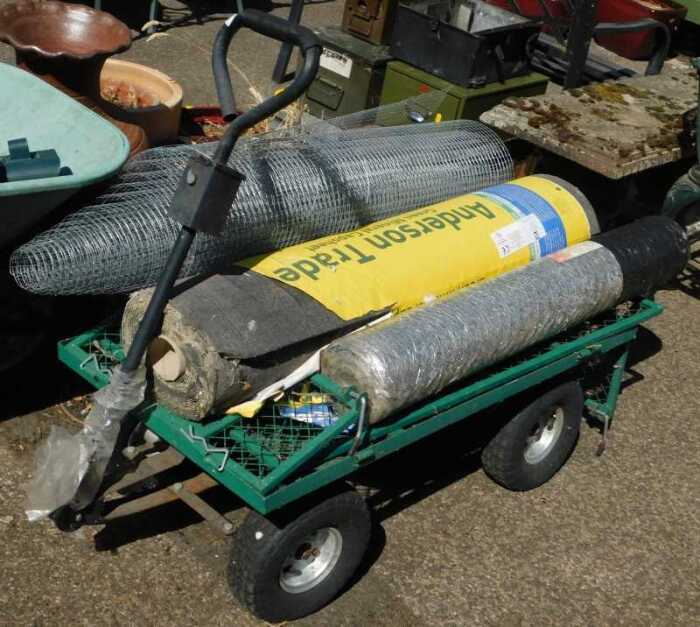 A garden trolley, together with two rolls of galvanised wire, and a Green Mineral capsheet.