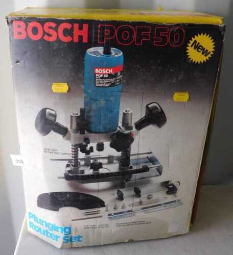 A Bosch POF50 plunging router set, boxed.