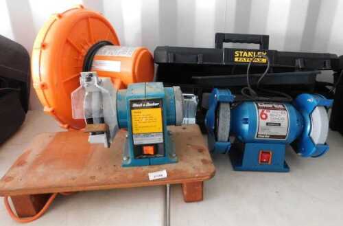 A Black and Decker bench grinder, mounted on a wooden stand, together with an air blower, and a...