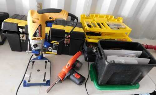 A drill press stand, containing a Clarke electric drill, a Black and Decker power file belt...