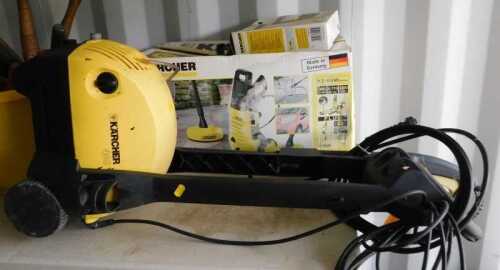 A Karcher high pressure cleaner, boxed, and another, model 480, and a hose.