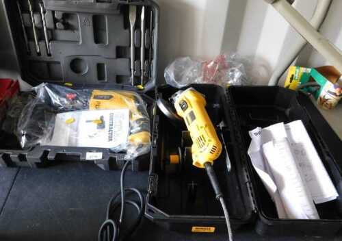 A Clarke Contractor five function rotary hammer drill, and a Dewalt electric angle grinder, boxed.