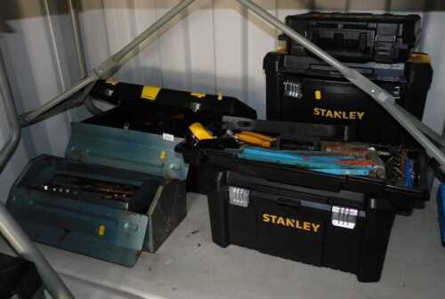 Two Stanley plastic toolboxes, and another, containing some handtools, together with a metal...