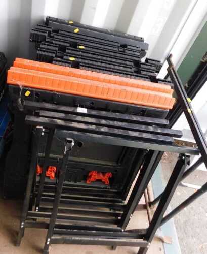 Eight plastic trestles, two metal trestle stands, and four smaller steel trestles.