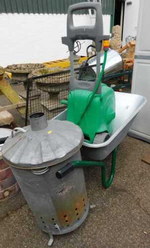 A garden incinerator bin, a garden hose reel, and a galvanised steel wheelbarrow. (3)