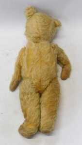 A group of early 20thC straw filled soft toys, comprising a blonde jointed Teddy bear, 39cm high,... - 3