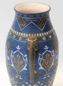 A late 19thC Mettlach pottery twin-handled vase, of cylindrical tapering form with incised... - 2