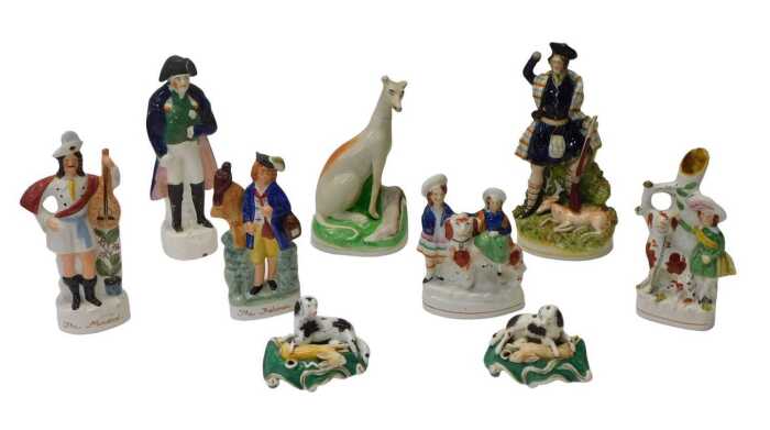 A group of 19thC and later Staffordshire and other pottery, to include a pair of pen holders,...