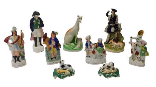 A group of 19thC and later Staffordshire and other pottery, to include a pair of pen holders,...