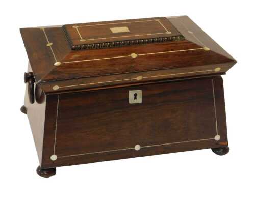 A Regency inlaid rosewood sarcophagus-shaped workbox, the caddy-shaped hinged lid with mother-of-...
