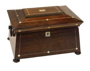 A Regency inlaid rosewood sarcophagus-shaped workbox, the caddy-shaped hinged lid with mother-of-...