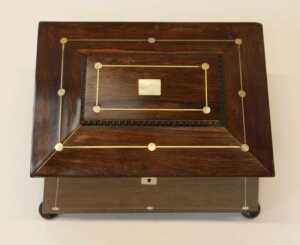 A Regency inlaid rosewood sarcophagus-shaped workbox, the caddy-shaped hinged lid with mother-of-... - 2