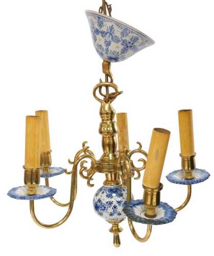 A 20thC Delft pottery and brass five branch chandelier, decorated with flowers, including...