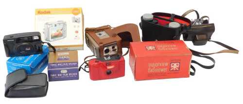 Cameras and optical related equipment, to include a Kodak Brownie 8mm movie camera, a Coronet...