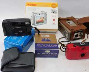 Cameras and optical related equipment, to include a Kodak Brownie 8mm movie camera, a Coronet... - 2