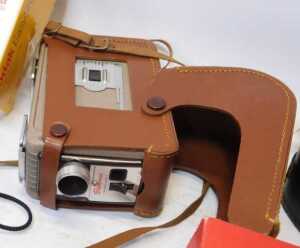 Cameras and optical related equipment, to include a Kodak Brownie 8mm movie camera, a Coronet... - 5