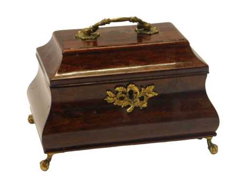 A Georgian mahogany bombe tea caddy, the hinged lid with brass swing handle, the interior with...
