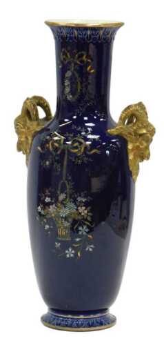 An early 20thC Longchamp Terre de Fer twin handled vase, of cylindrical tapering form with...
