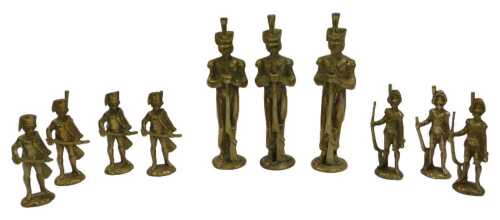 A group of brass figures, each modelled as Napoleonic era soldiers, to include three holding...