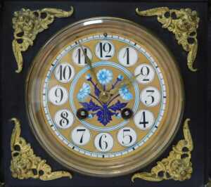 An early 20thC Aesthetic movement clock, in a Gothic Revival case, with painted enamel dial with... - 2
