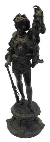 A 19thC painted spelter model, depicting a Continental huntsman holding a fox, with one arm...