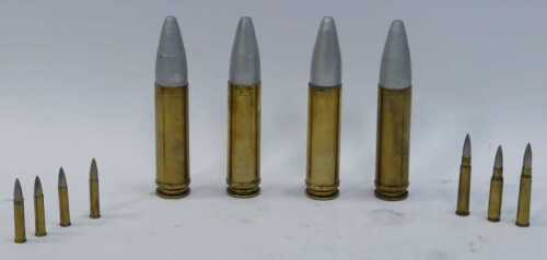 Spent or discharged brass shell cases. (1 tray)
