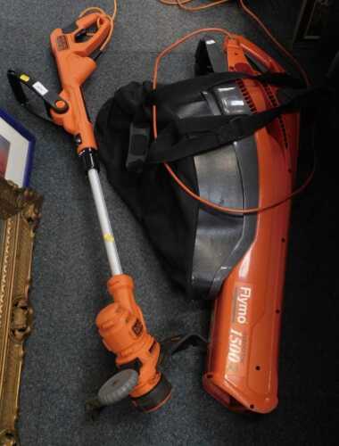 A Black and Decker strimmer, BESTA5 Series, and a Flymo 1500 Plus garden vac, with instruction...