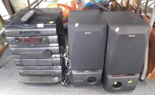 A Sony stacking hi-fi system, with twin speakers, turntable, tuner, twin tape decks, CD player,...