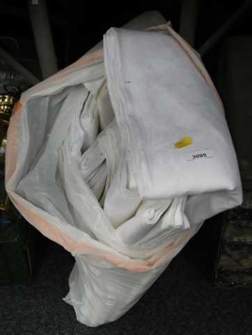 Textiles, to include a bag containing a large quantity of table linen.