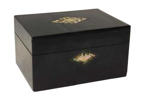 A Victorian lady's travelling toilet and workbox, the ebonised case with lozenge shaped inlaid...