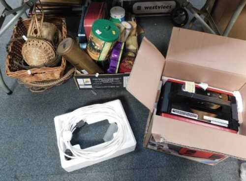 A boxed Clark 700w portable generator, a box containing tins and wicker baskets, etc. (contents...