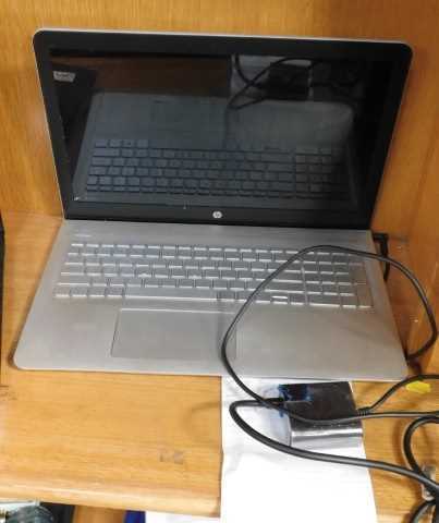 A HP Envy 13" laptop, with 128gb SSDS, 1tb data drive and 8gb of RAM, Windows 10 pre-installed...