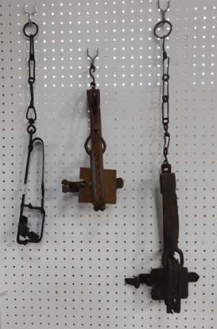 Three animal traps.