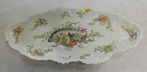 A Limoges porcelain fish platter, gilt border, 56cm wide.