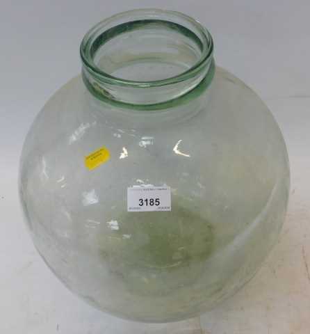 A clear glass globular carboy, 34cm high.